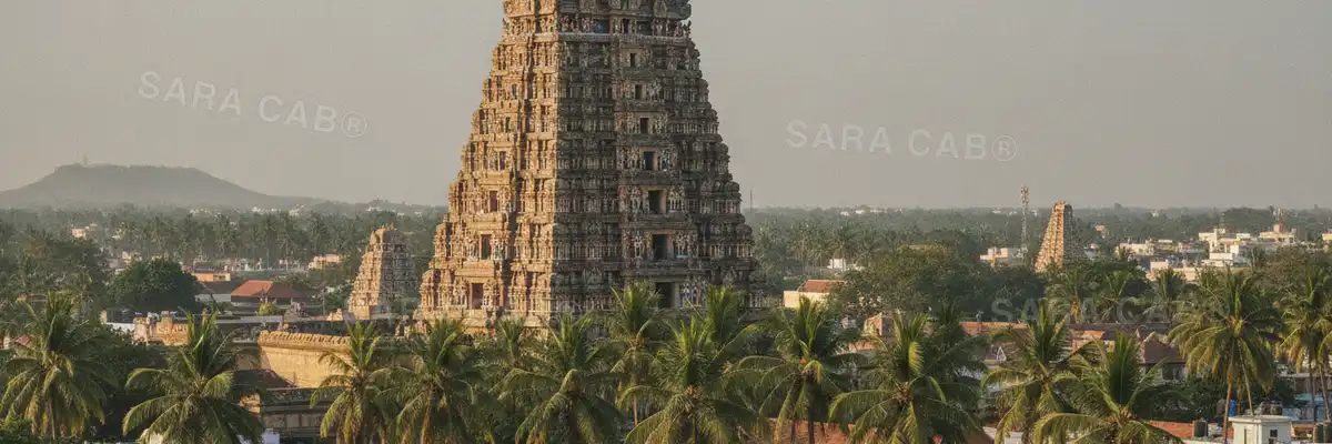 A temple gopuram rising above the streets of Kanchipuram